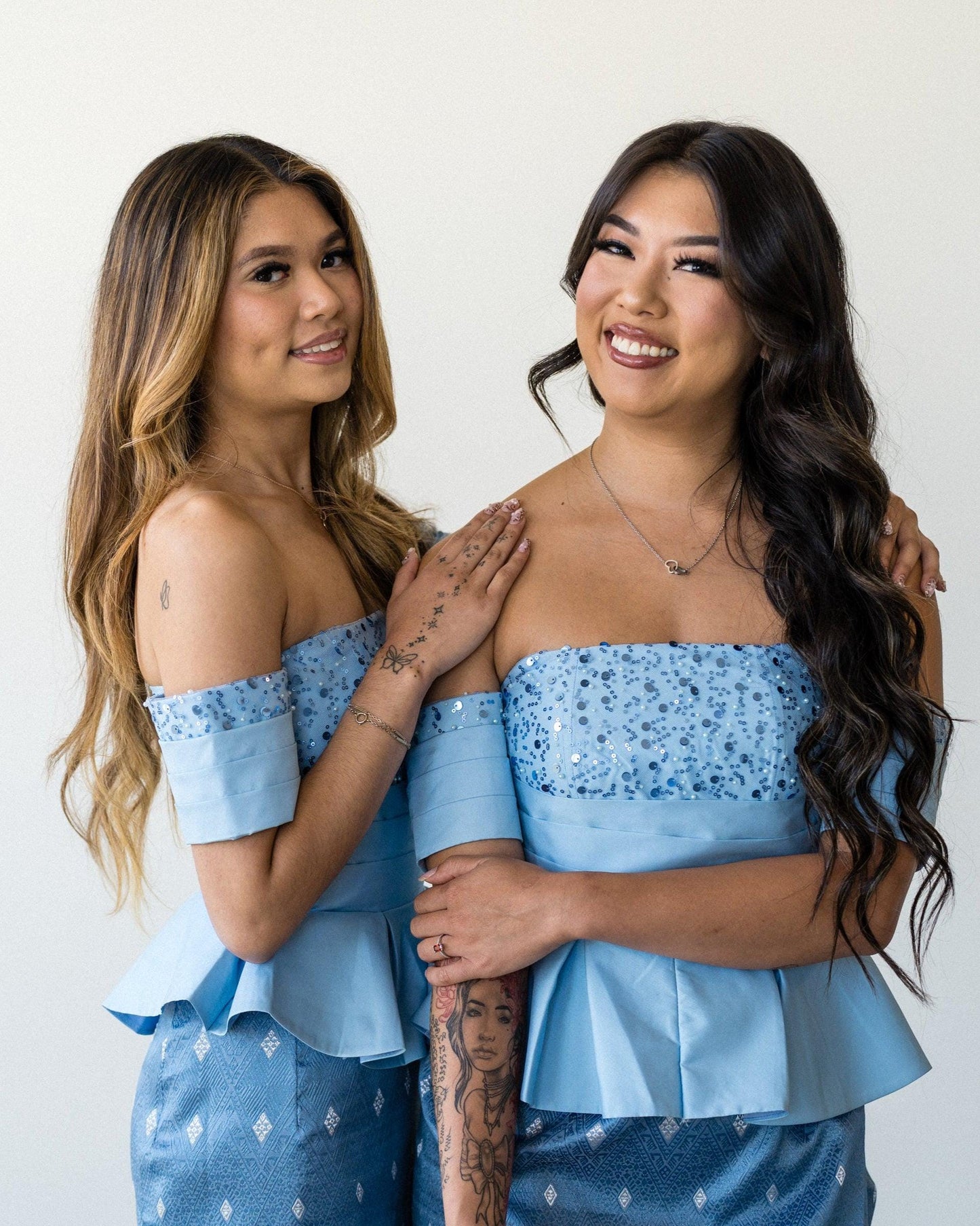 Off-Shoulder Peplum Tops – Modern Lao Style (Light Blue)